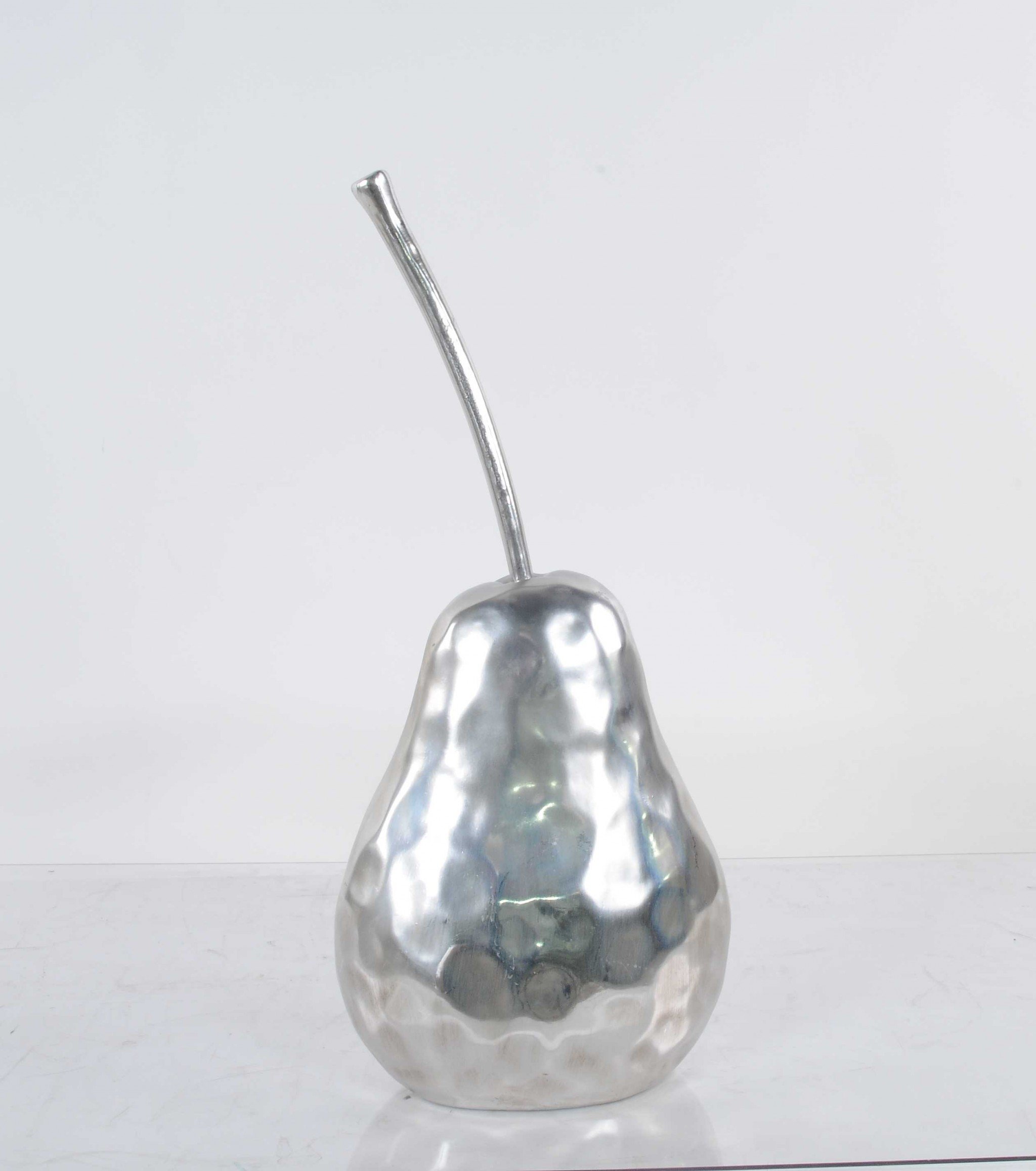 A beautifully crafted pear statue with a hammered nickel finish, showcasing its elegant design and texture, perfect for home decor.