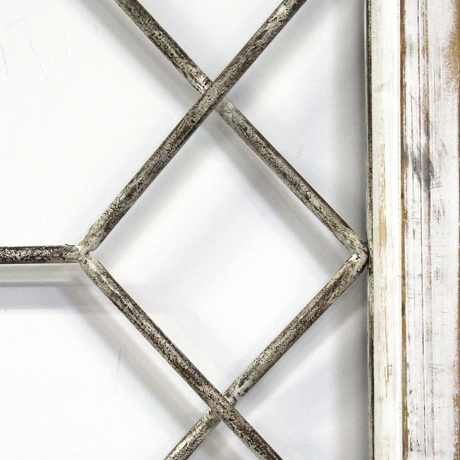 Distressed white metal and wood framed wall art featuring a geometric Y design, perfect for rustic home decor.