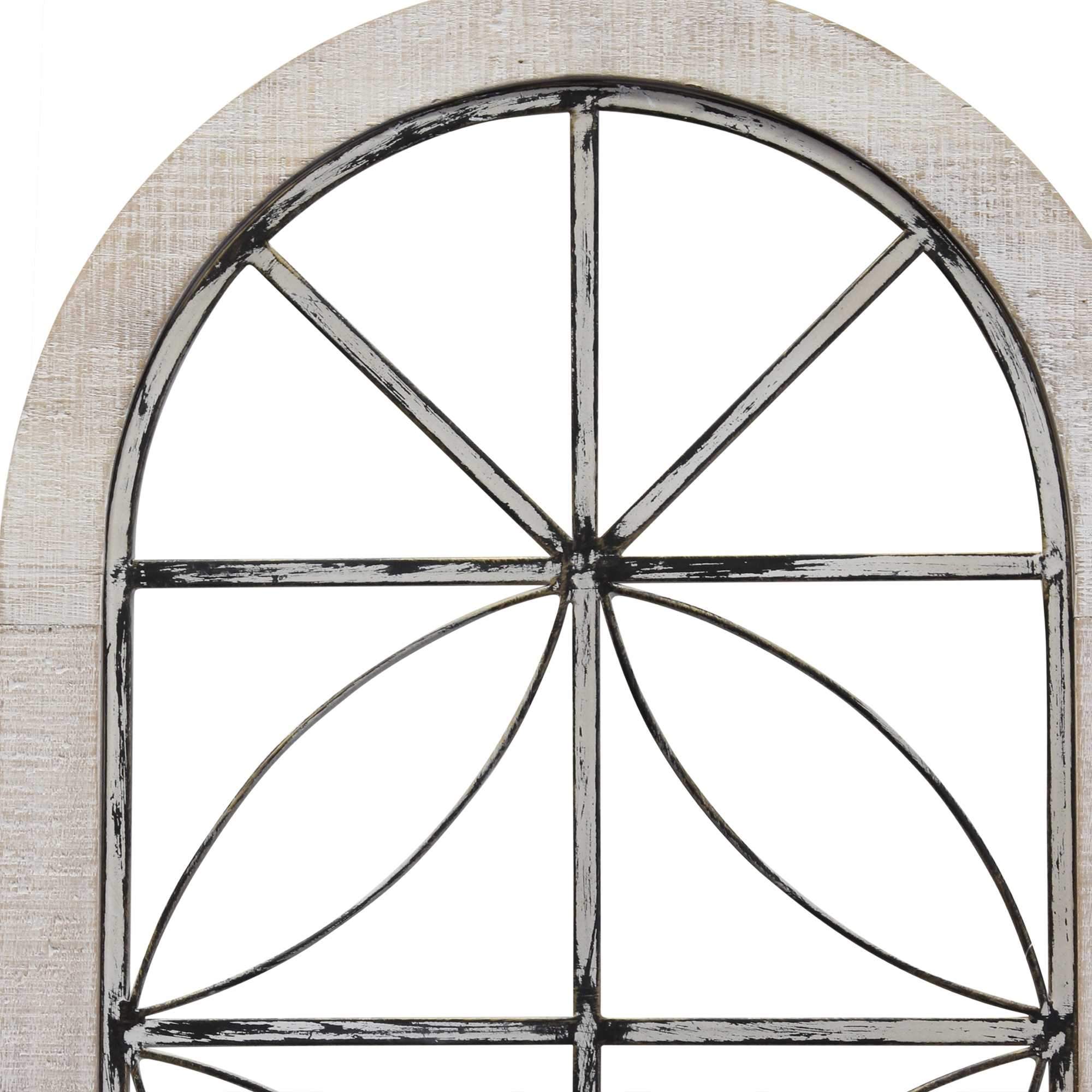 Distressed white metal and wood window panel with geometric patterns, showcasing farmhouse charm.