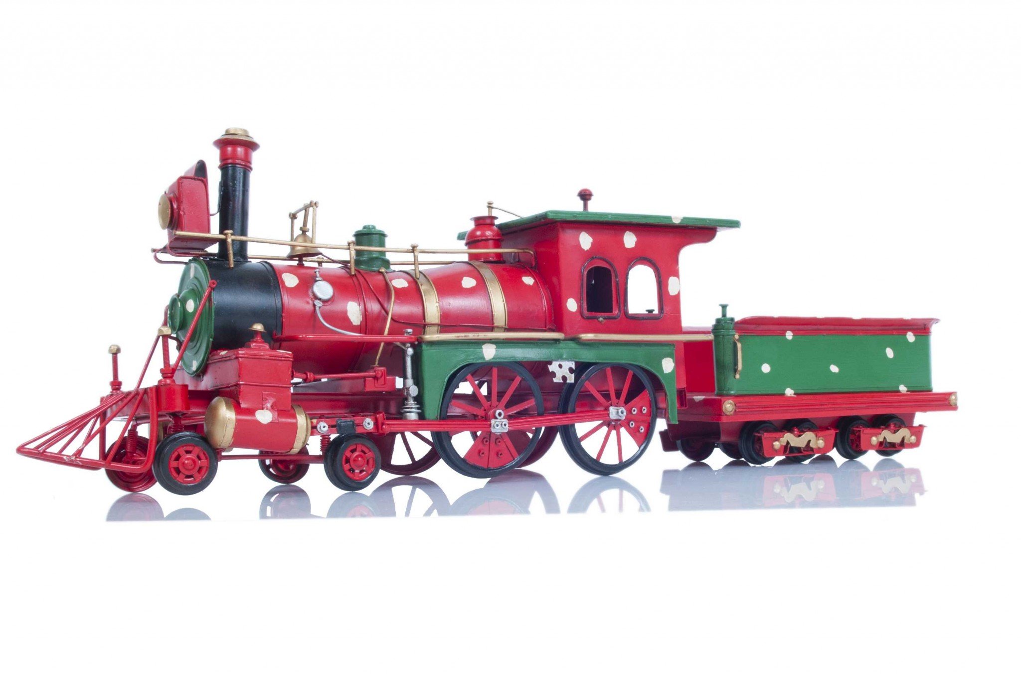 A beautifully crafted Handmade Tin Christmas Train Model in vibrant red, featuring intricate details like rolling wheels and a detachable caboose.