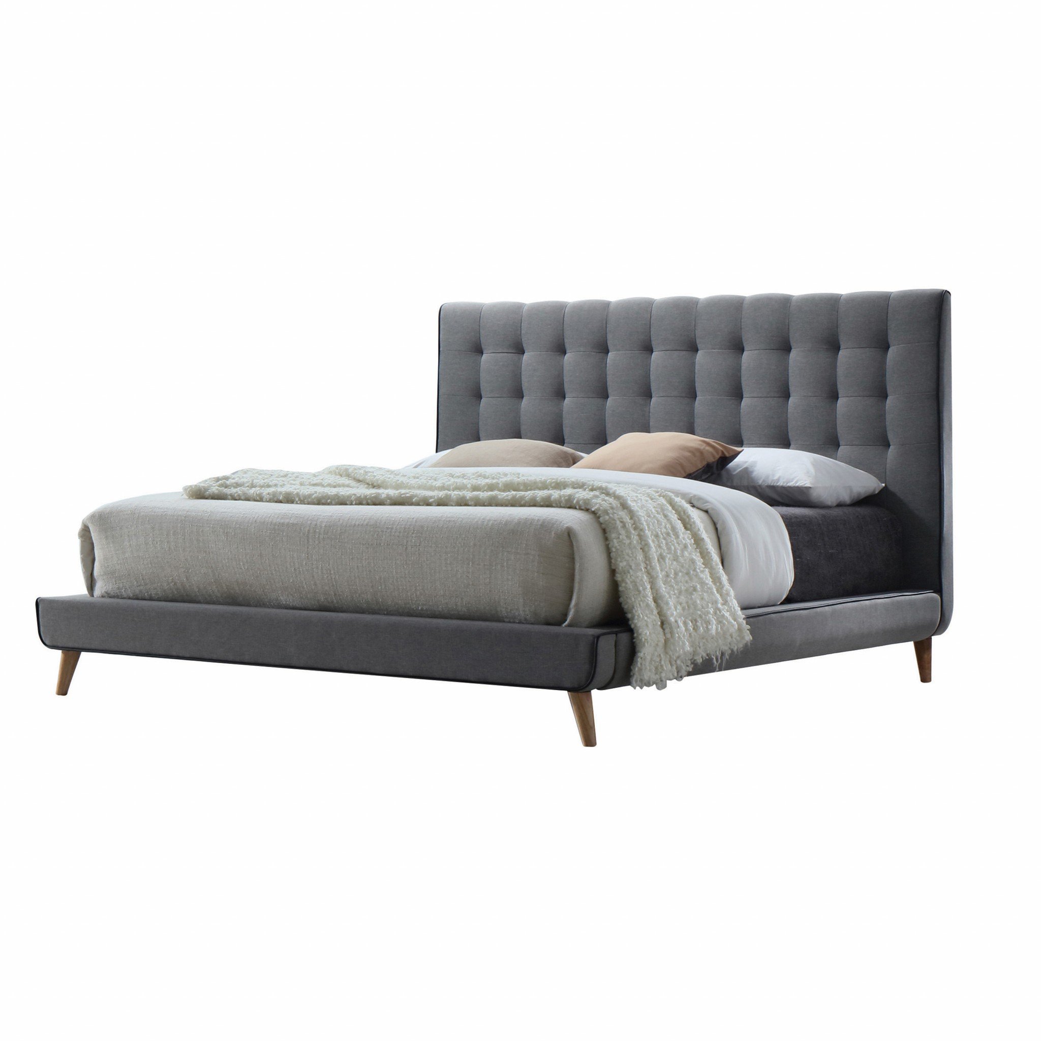 Light gray buttonless tufted fabric queen bed with natural finish legs and black welt trim, showcasing elegant design and plush upholstery.