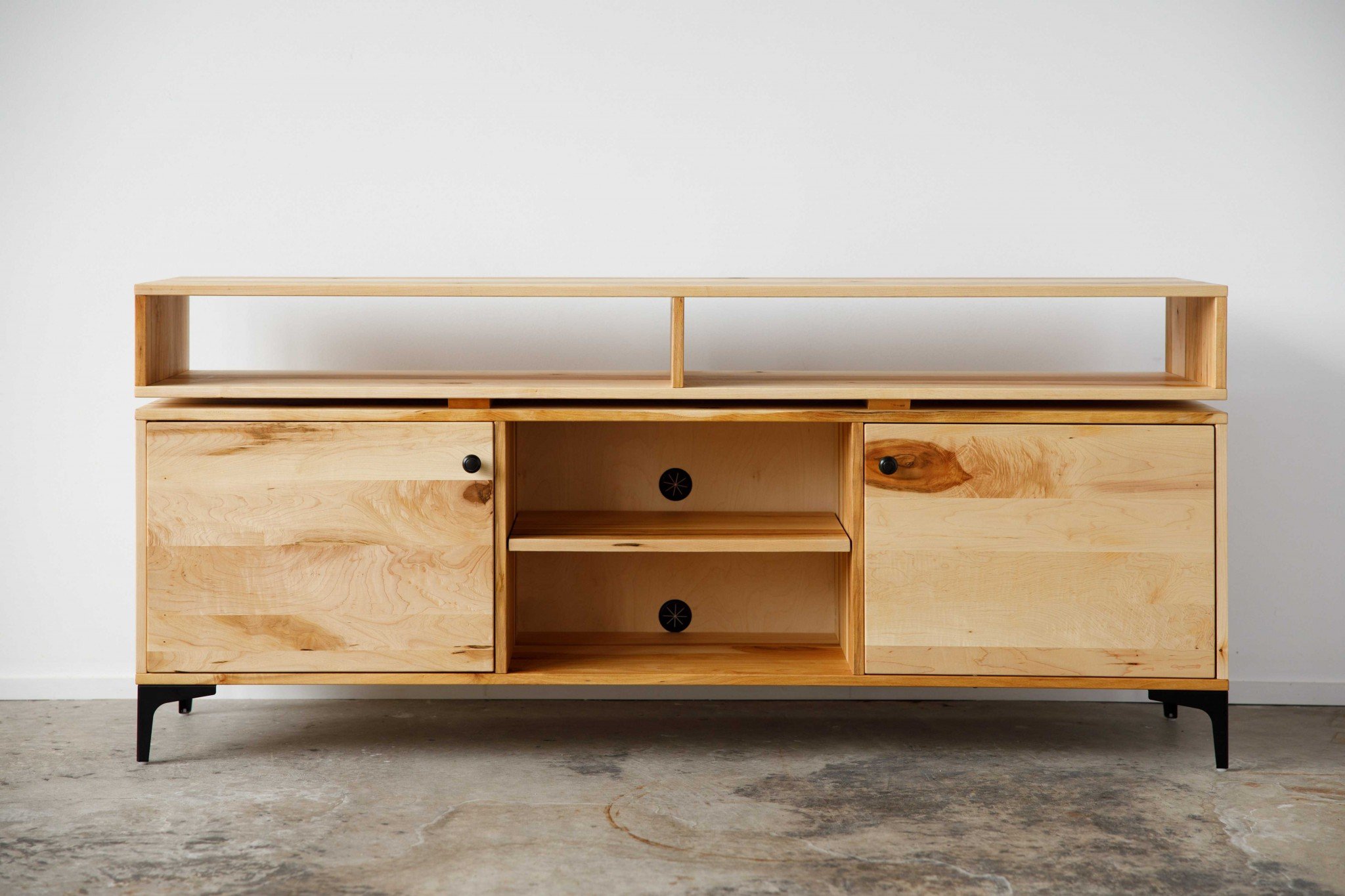 Natural Maple and Steel Multi Compartment TV Stand showcasing mid-century modern design with multiple storage compartments.