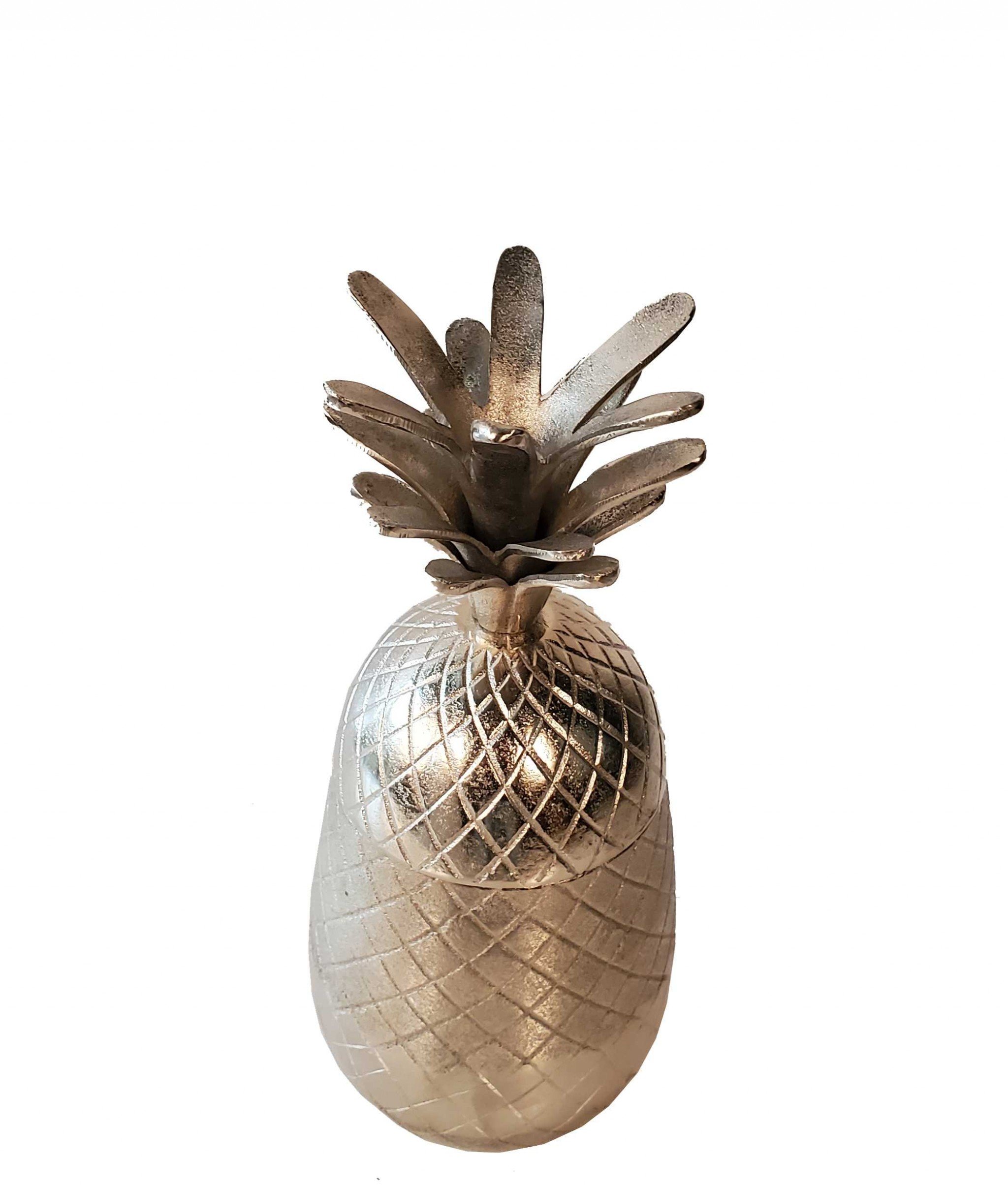 Vibrant pineapple-shaped aluminum decor with a storage compartment, perfect for beach-themed interiors.