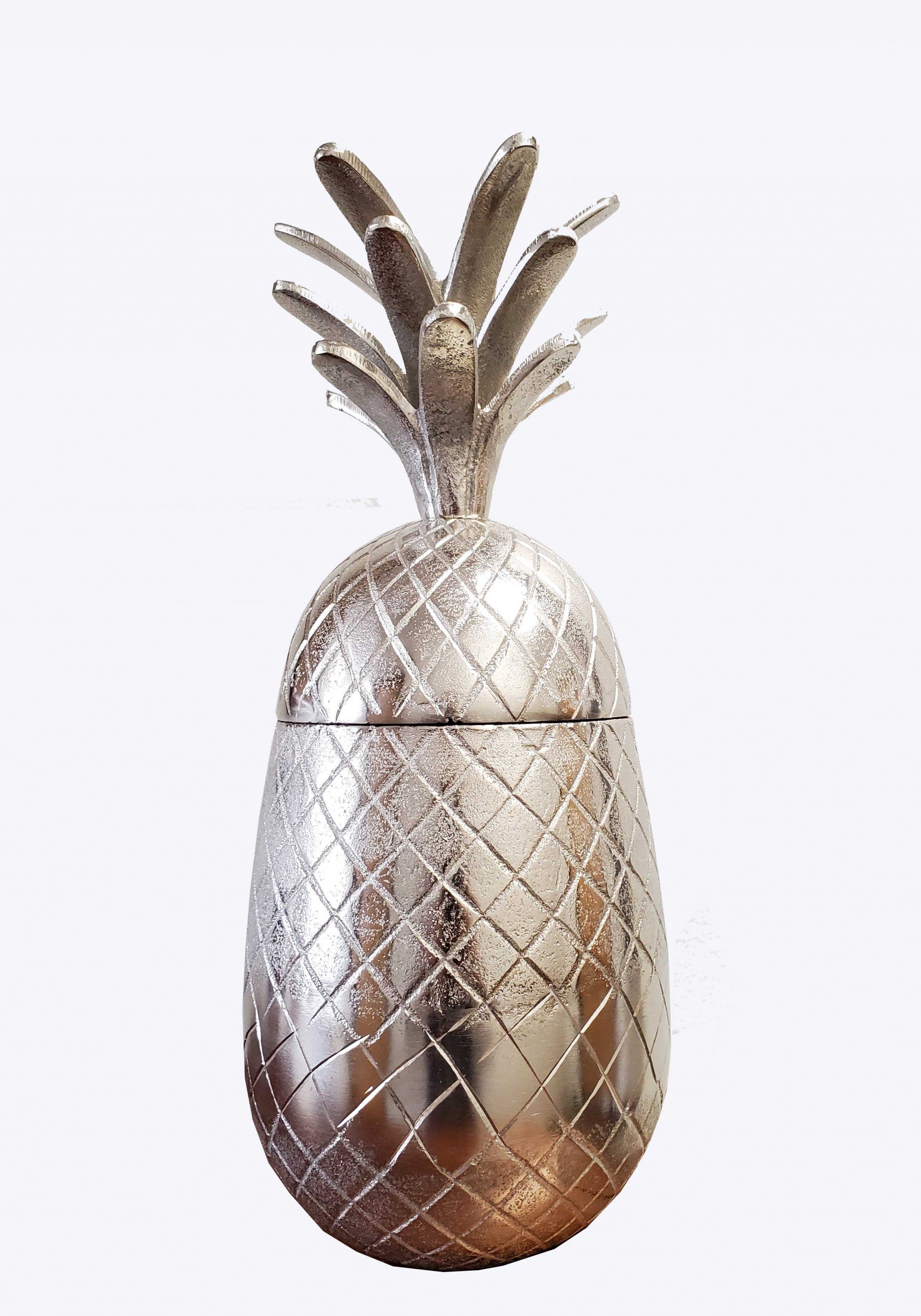 Vibrant pineapple-shaped aluminum decor with a storage compartment, perfect for beach-themed interiors.