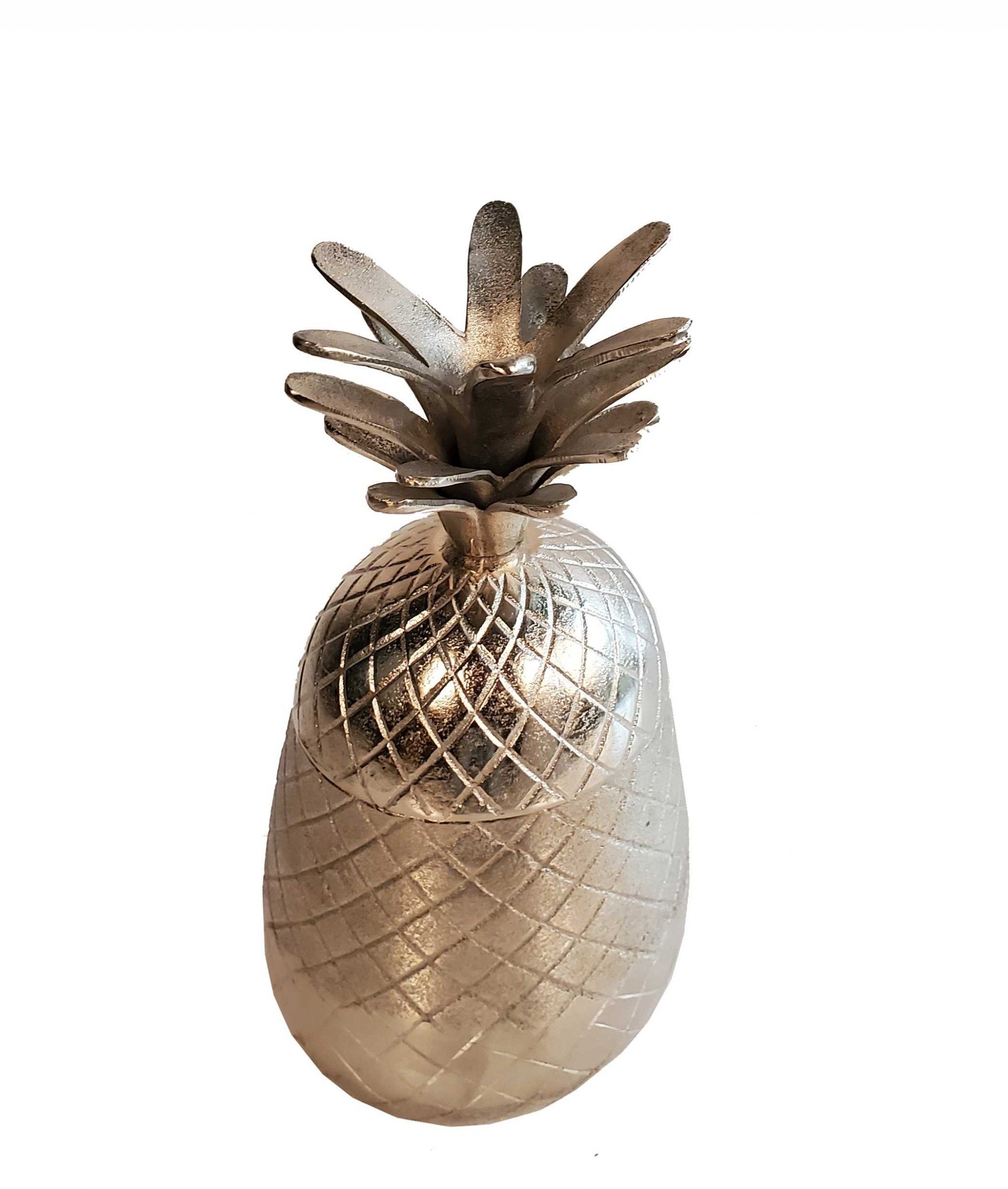 Vibrant pineapple-shaped aluminum decor with a storage compartment, perfect for beach-themed interiors.