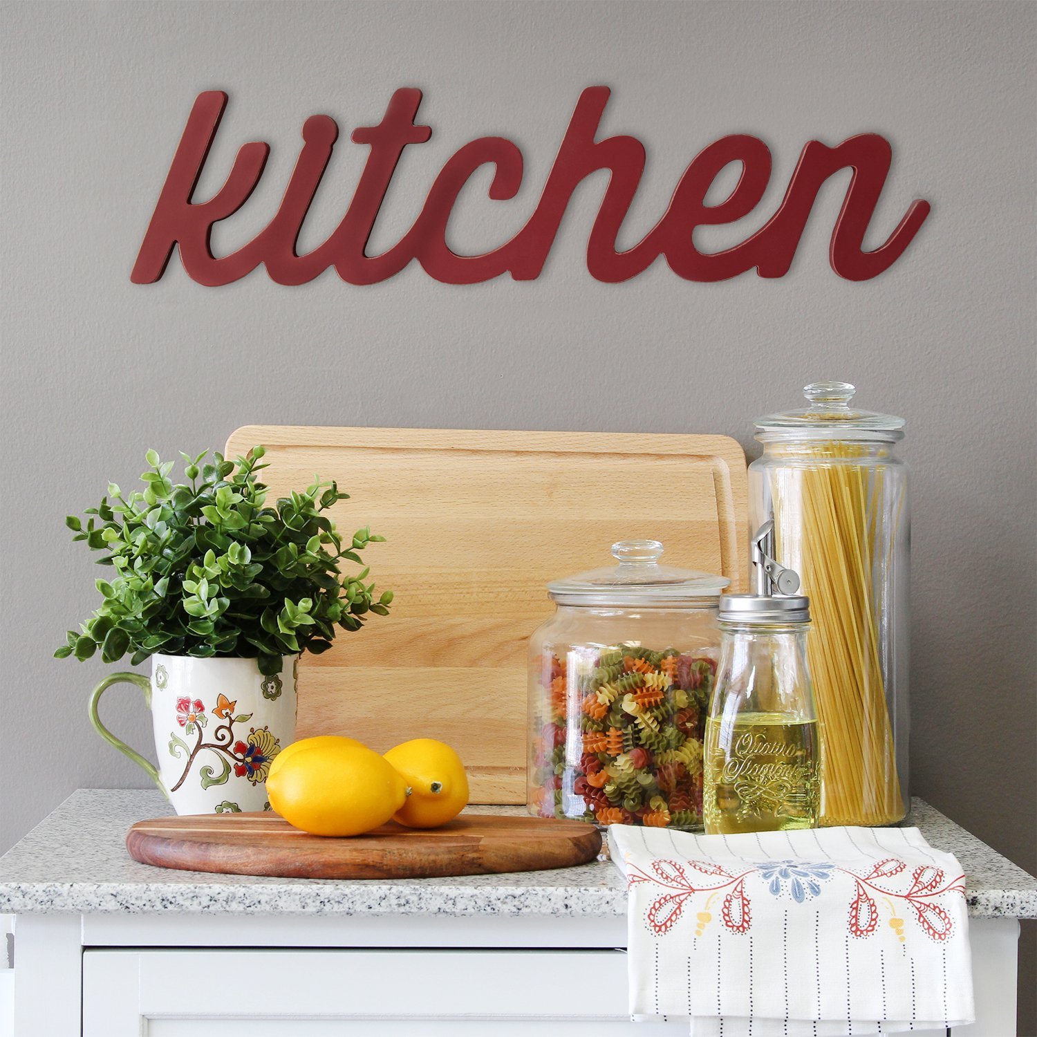 Hand-painted red wood word decor for kitchen, showcasing vibrant typography and charming design.