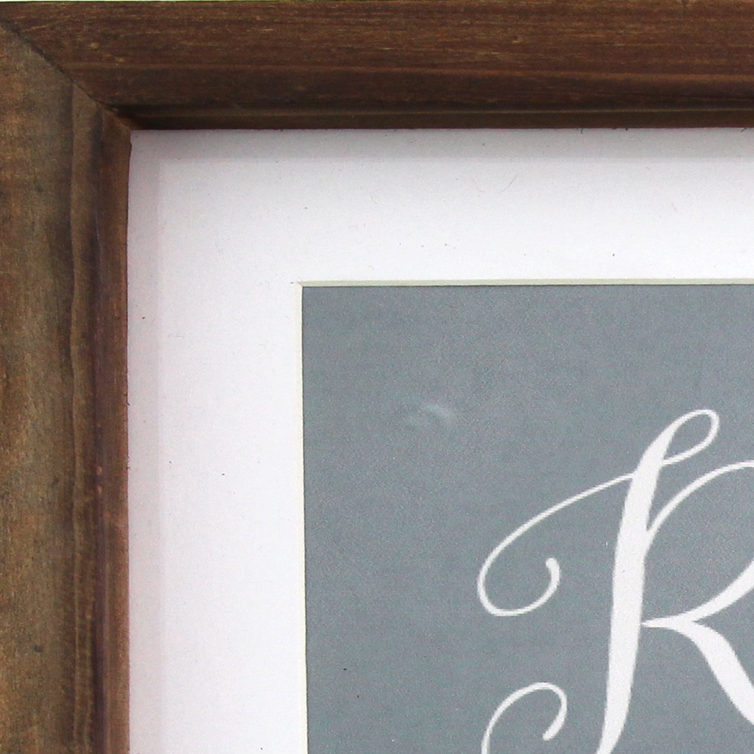 Framed bath art featuring the words Relax, Breathe, Soak, Unwind in elegant typography, perfect for bathroom decor.