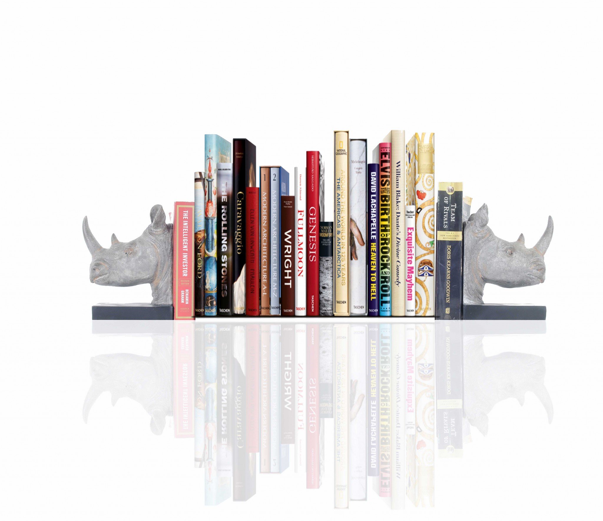 A set of two resin bookends featuring intricately designed rhino heads in dark grey with bronze accents, perfect for holding books upright.