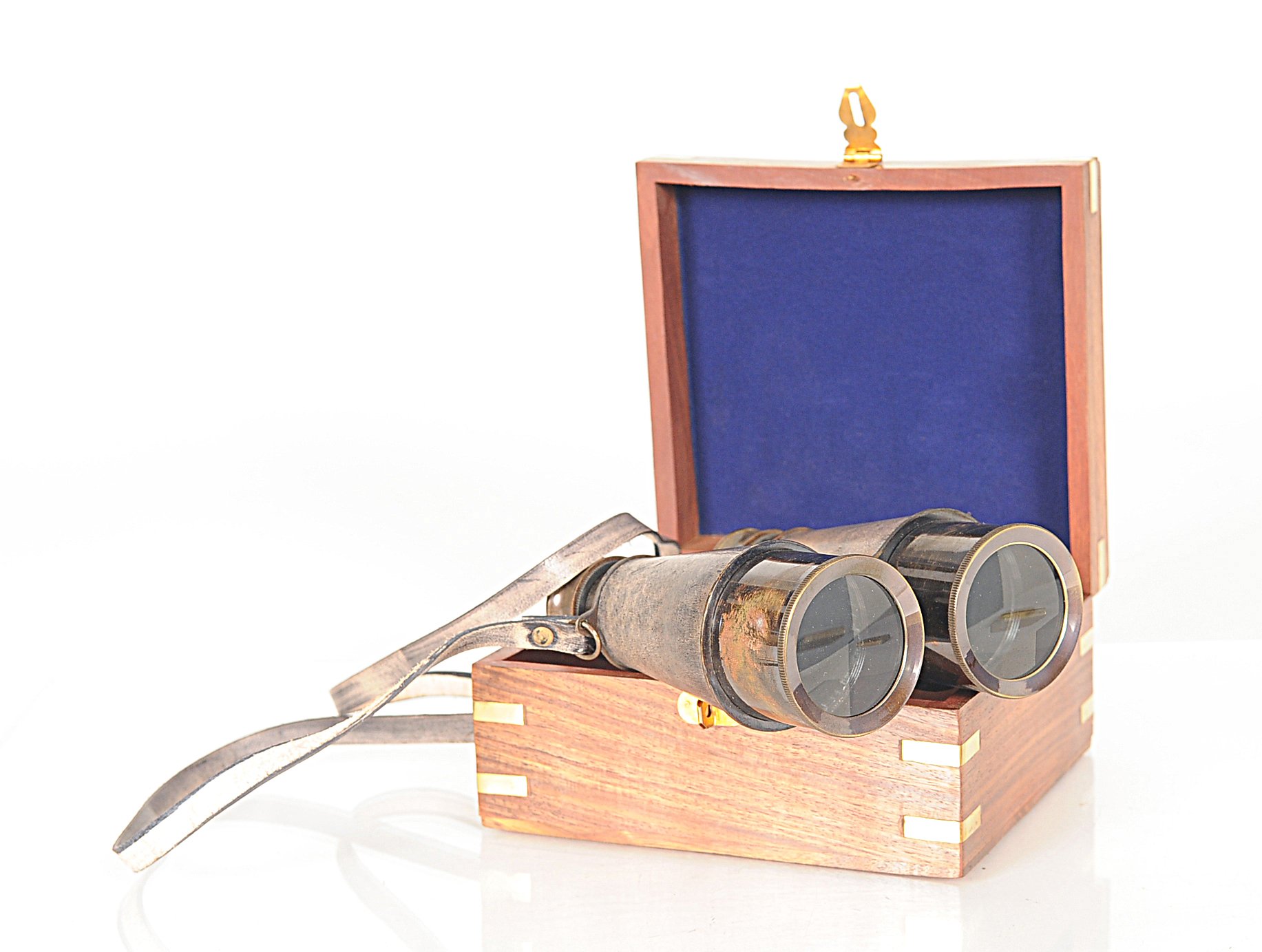 Rustic brass and leather binoculars with a wooden storage box, showcasing antique design and craftsmanship.