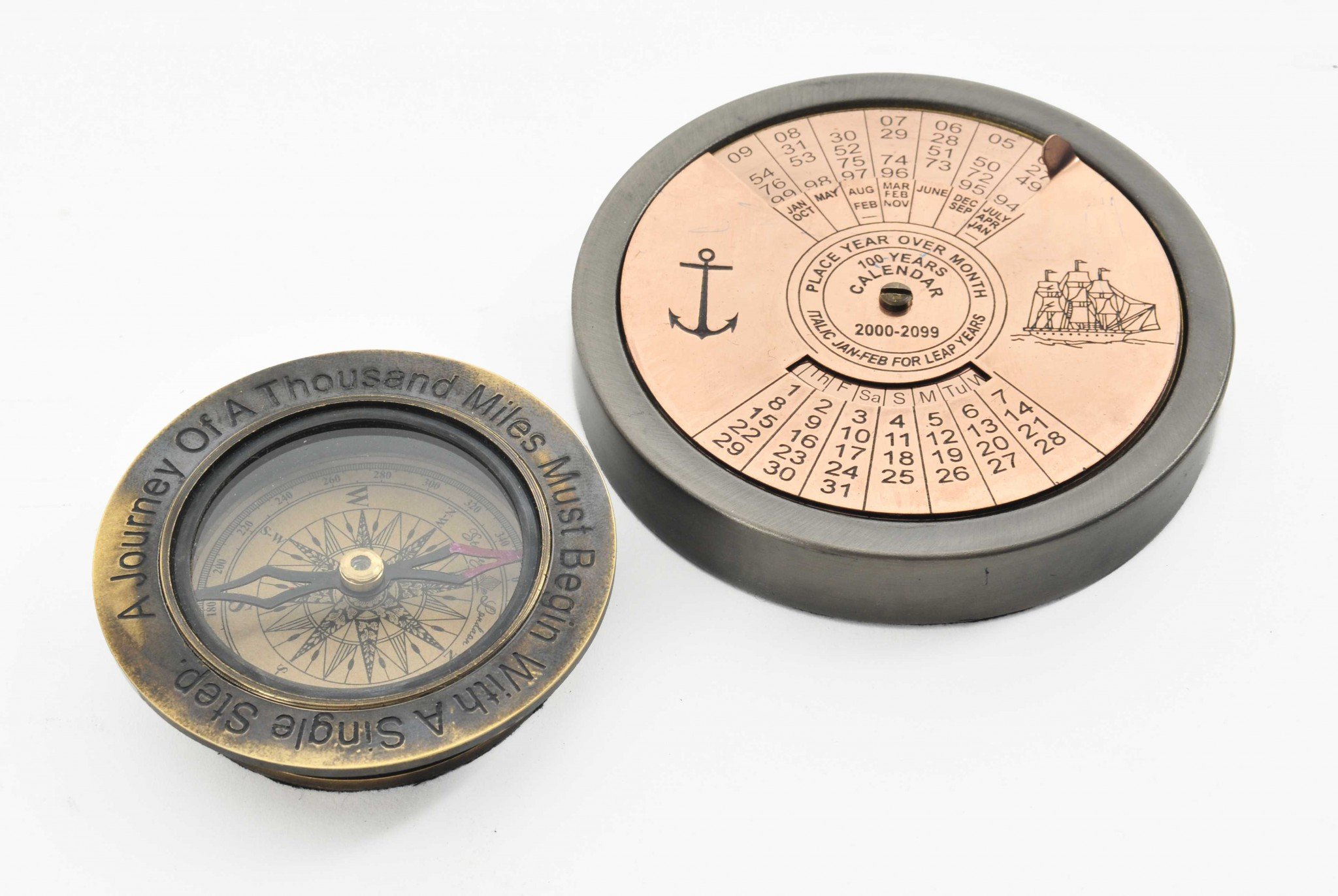 Set of 2 elegant pieces including a 100 Year Calendar with hand-carved details and a Compass Quote featuring an inspirational message, both in antique brass finish.