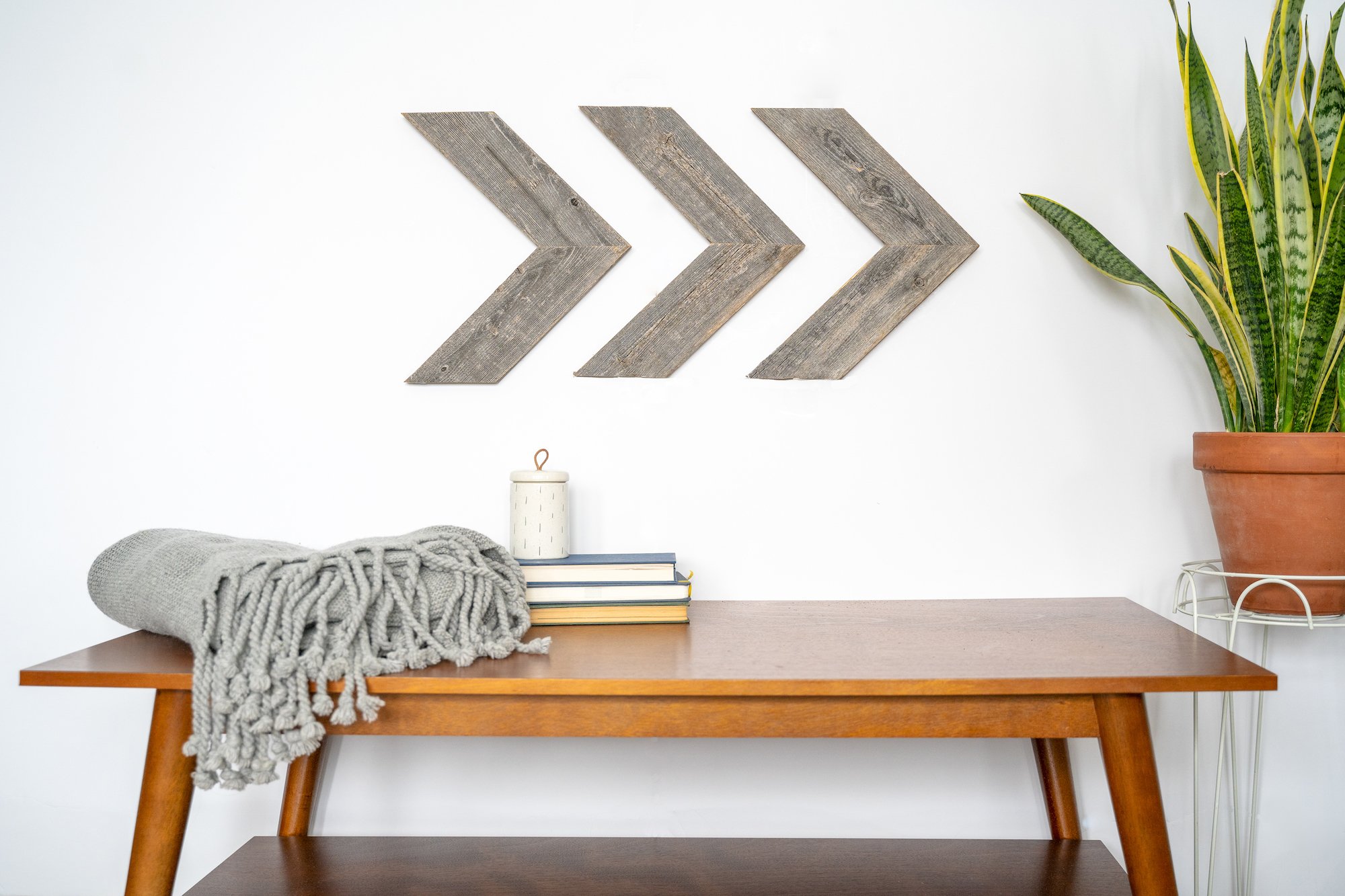 Set of 3 rustic weathered grey wood chevron arrows, showcasing unique handmade design and reclaimed wood texture.