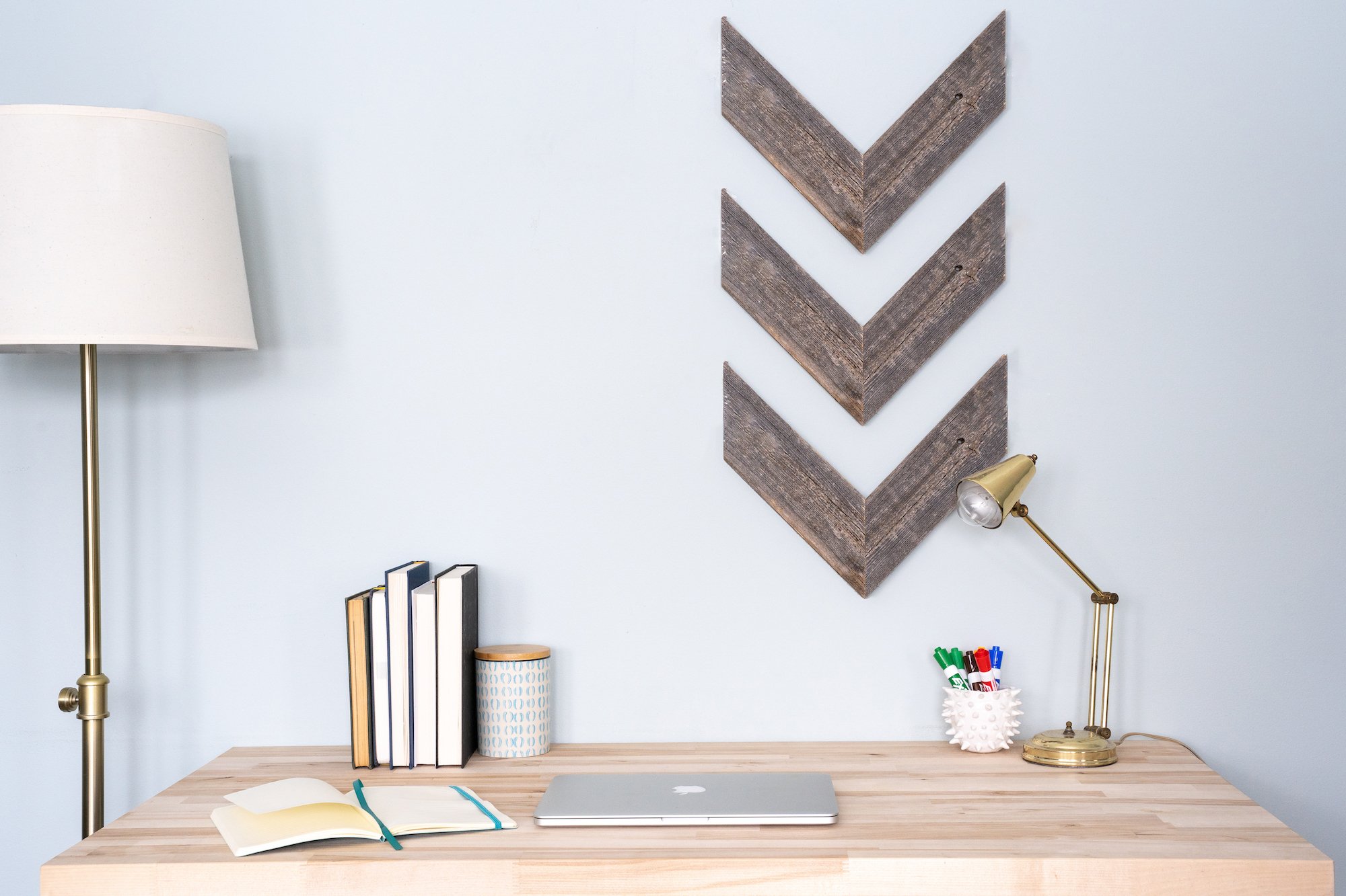 Set of 3 rustic weathered grey wood chevron arrows, showcasing unique handmade design and reclaimed wood texture.