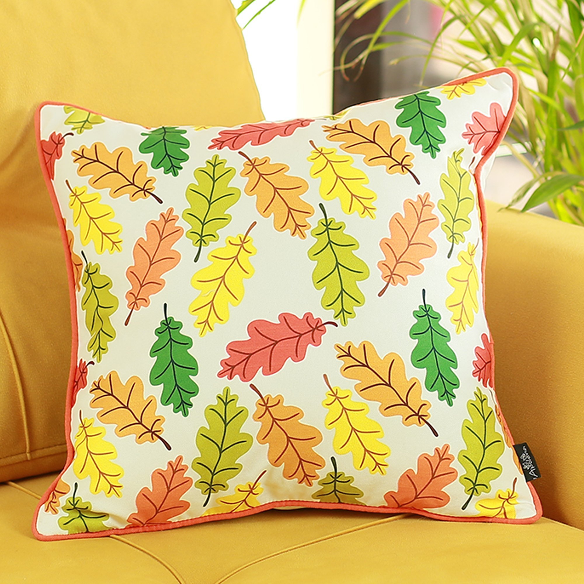 Set of 4 multicolor autumn leaves throw pillow covers, showcasing vibrant colors and a soft brushed polyester texture.