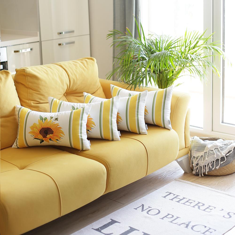 Set of 4 colorful sunflower design lumbar pillow covers on a sofa, showcasing vibrant yellow and green patterns.