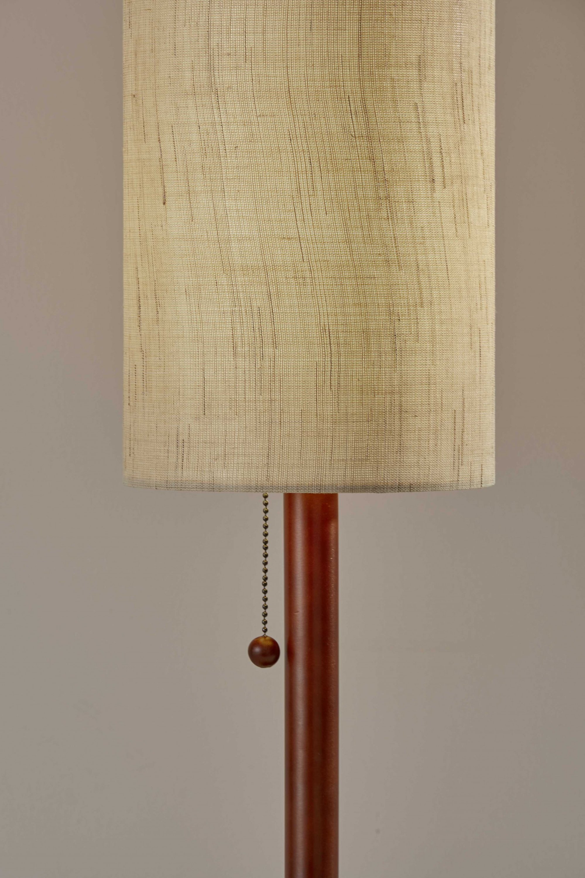 Slim Silhouette Walnut Wood Table Lamp with a double cylindrical shade and wood ball pull-chain, showcasing its modern design.