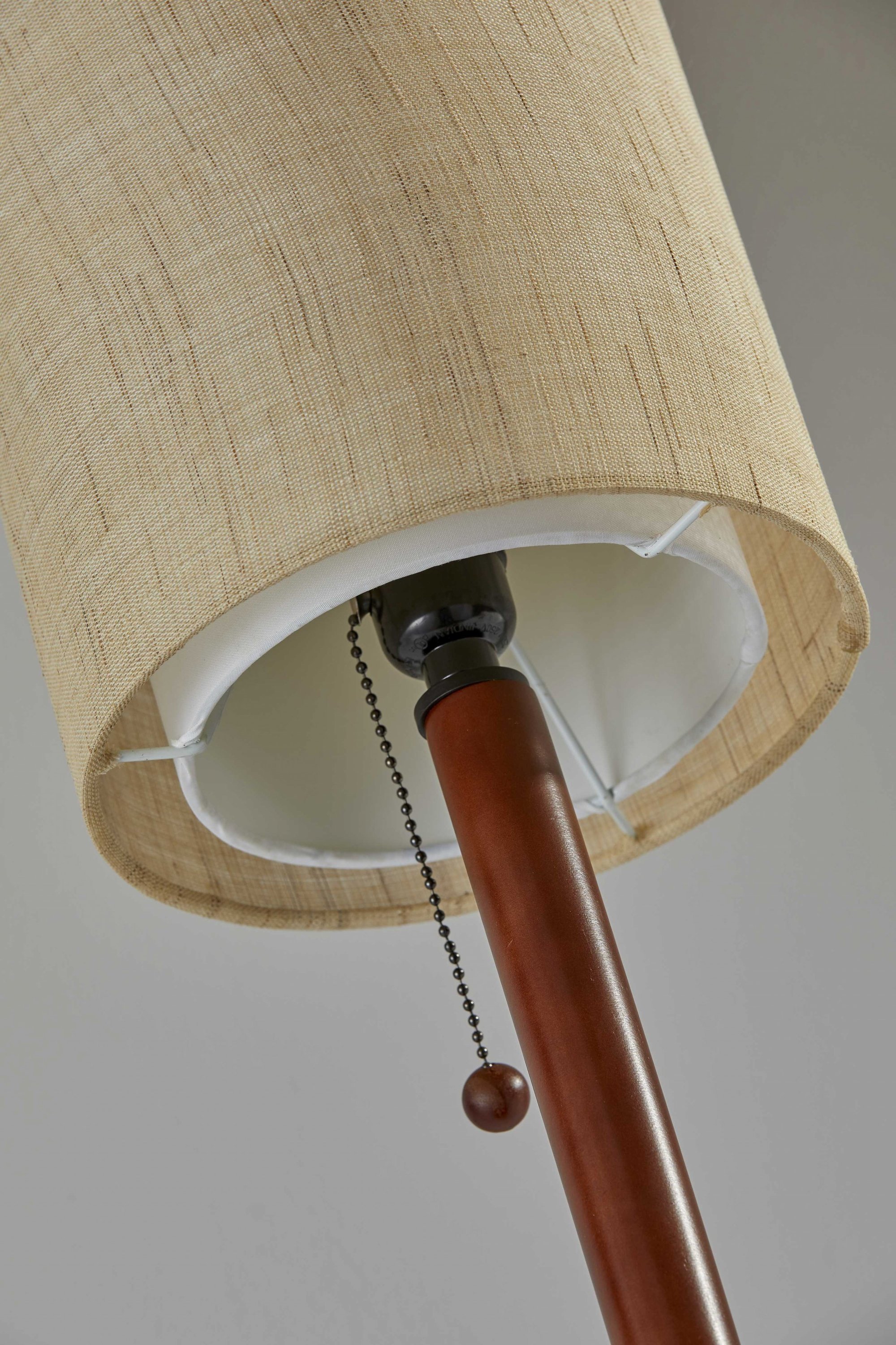 Slim Silhouette Walnut Wood Table Lamp with a double cylindrical shade and wood ball pull-chain, showcasing its modern design.