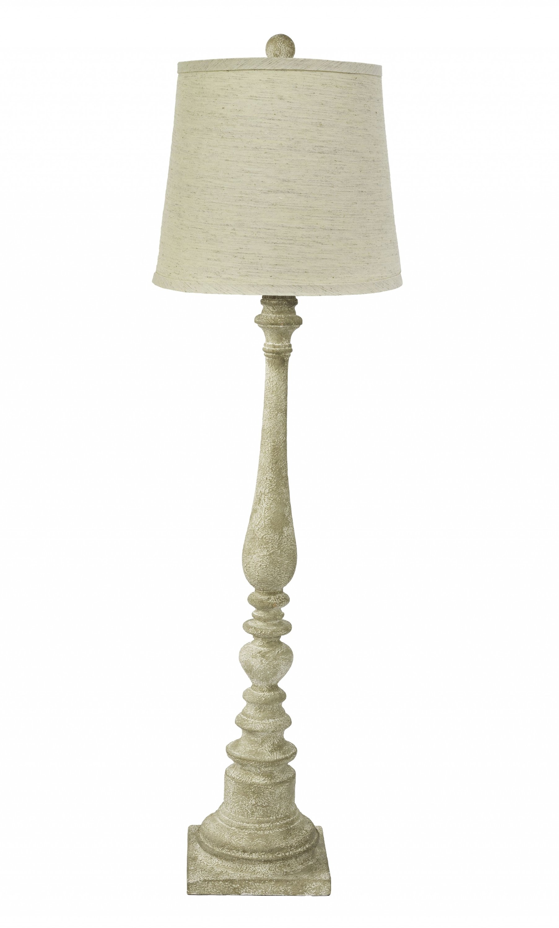 Tall Distressed Look Table Lamp with a classic neutral shade, showcasing its elegant design and warm lighting.