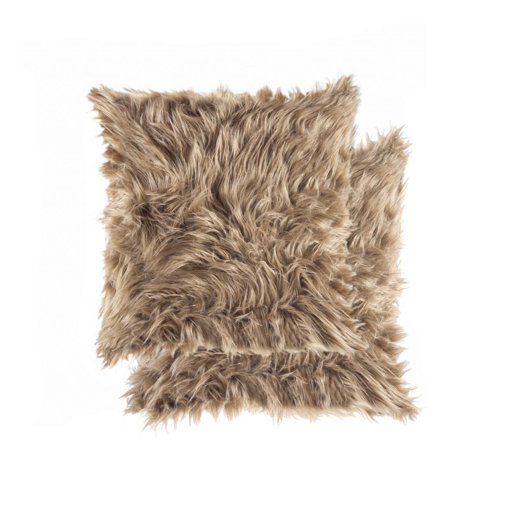 Two luxurious tan faux fur pillows with plush texture, perfect for home decor.