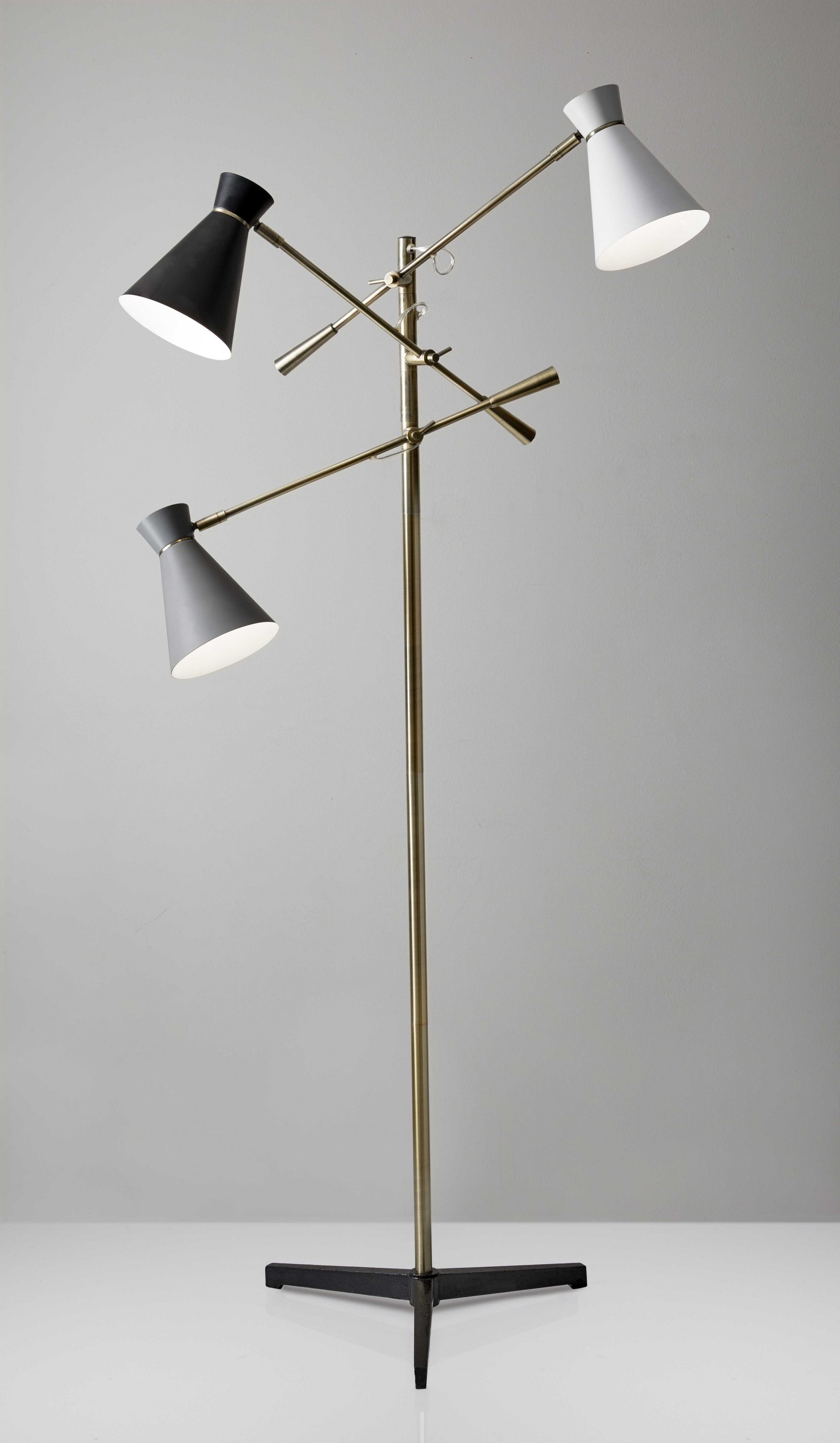 Three Arm Adjustable Floor Lamp in Brass Metal with Grey, Black, and White shades, featuring a stylish design and adjustable arms.