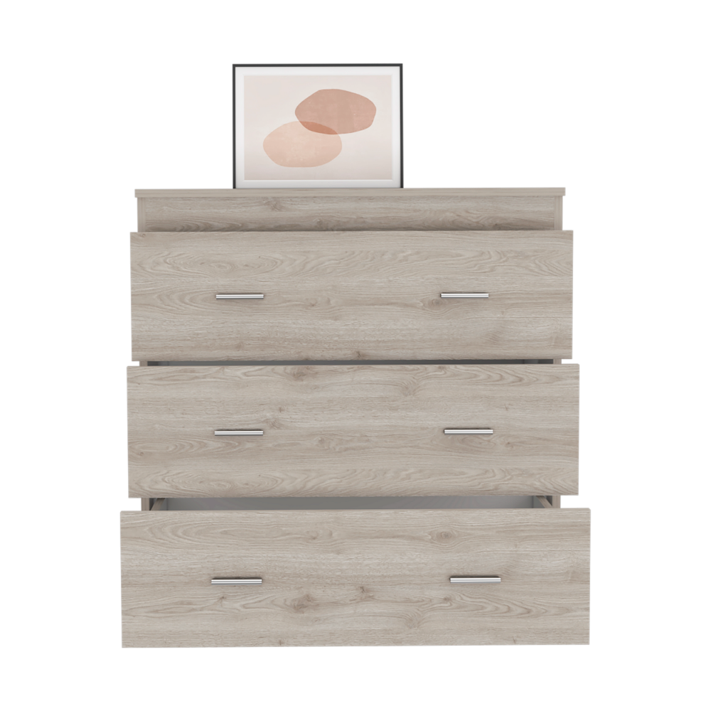 Whysk Three Drawer Dresser in light gray and white with three spacious drawers and a superior top for decoration.