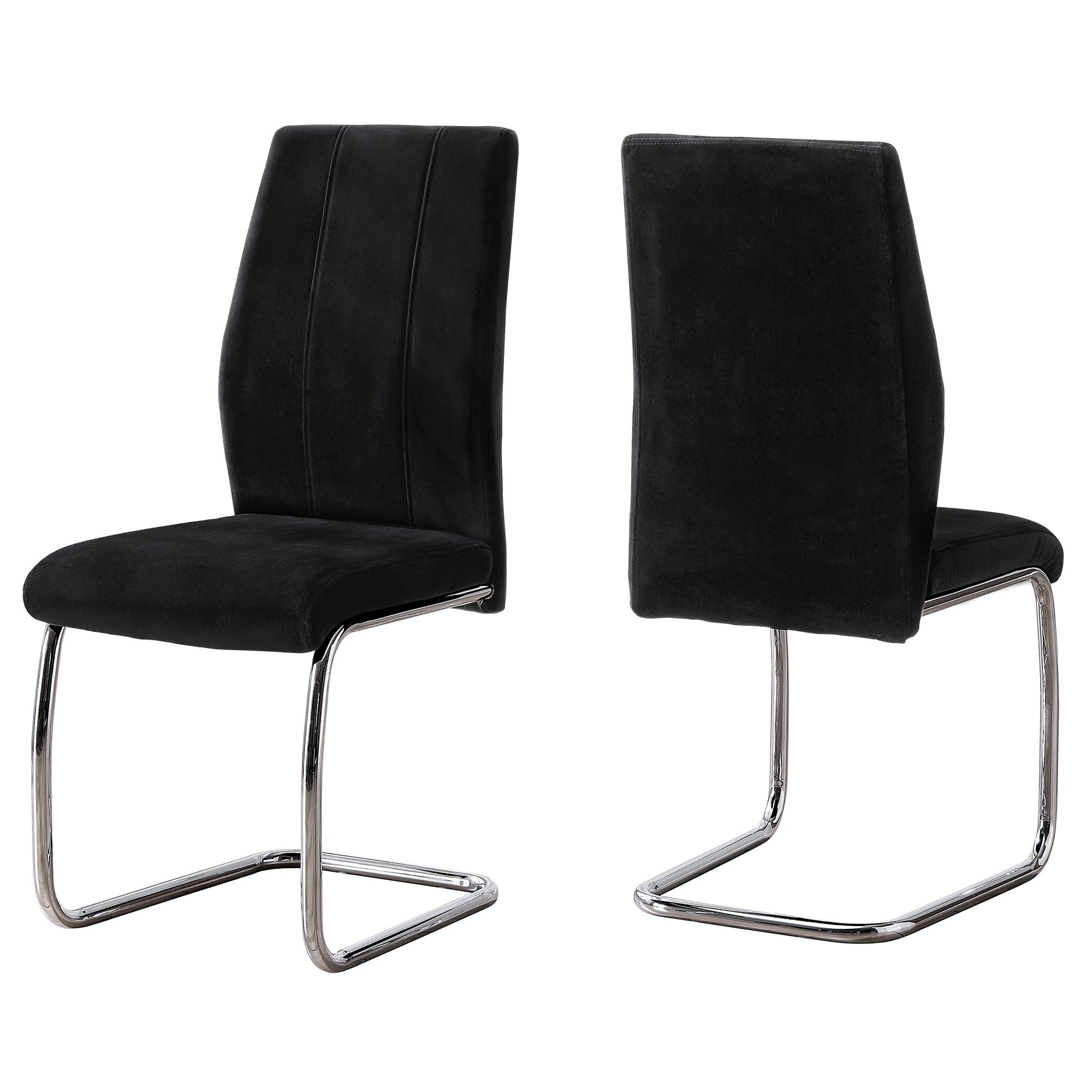 Two elegant velvet dining chairs with chrome metal legs, showcasing a modern design and comfortable foam cushioning.