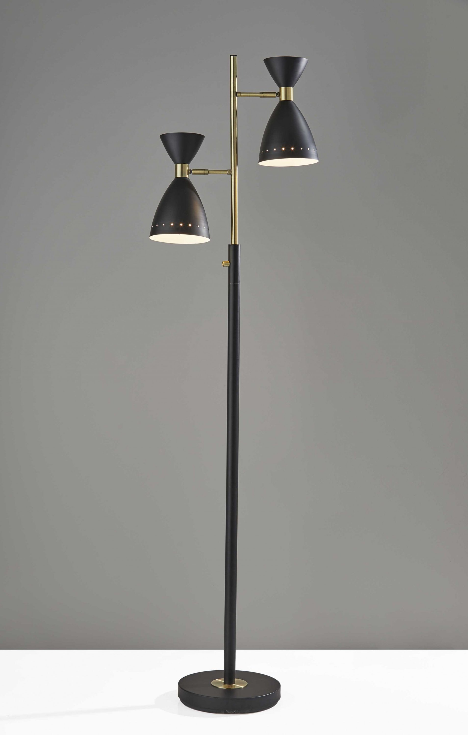 Two Light Brass Cinch Floor Lamp featuring black metal and antique brass finishes with adjustable shades.