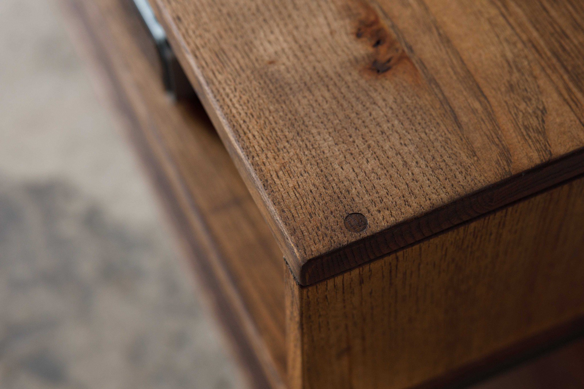 Close-up of wooden furniture corner.