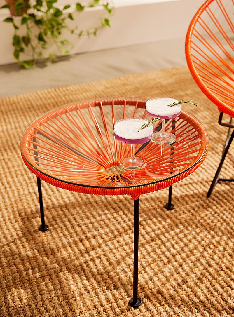 Zicatela Coffee Table featuring a tempered glass top and colorful vinyl cord design, perfect for small spaces.