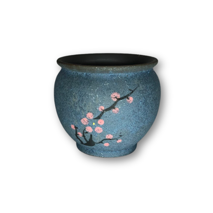 A decorative blue Asian style pot featuring a cherry blossom branch design, perfect for indoor or outdoor plants.