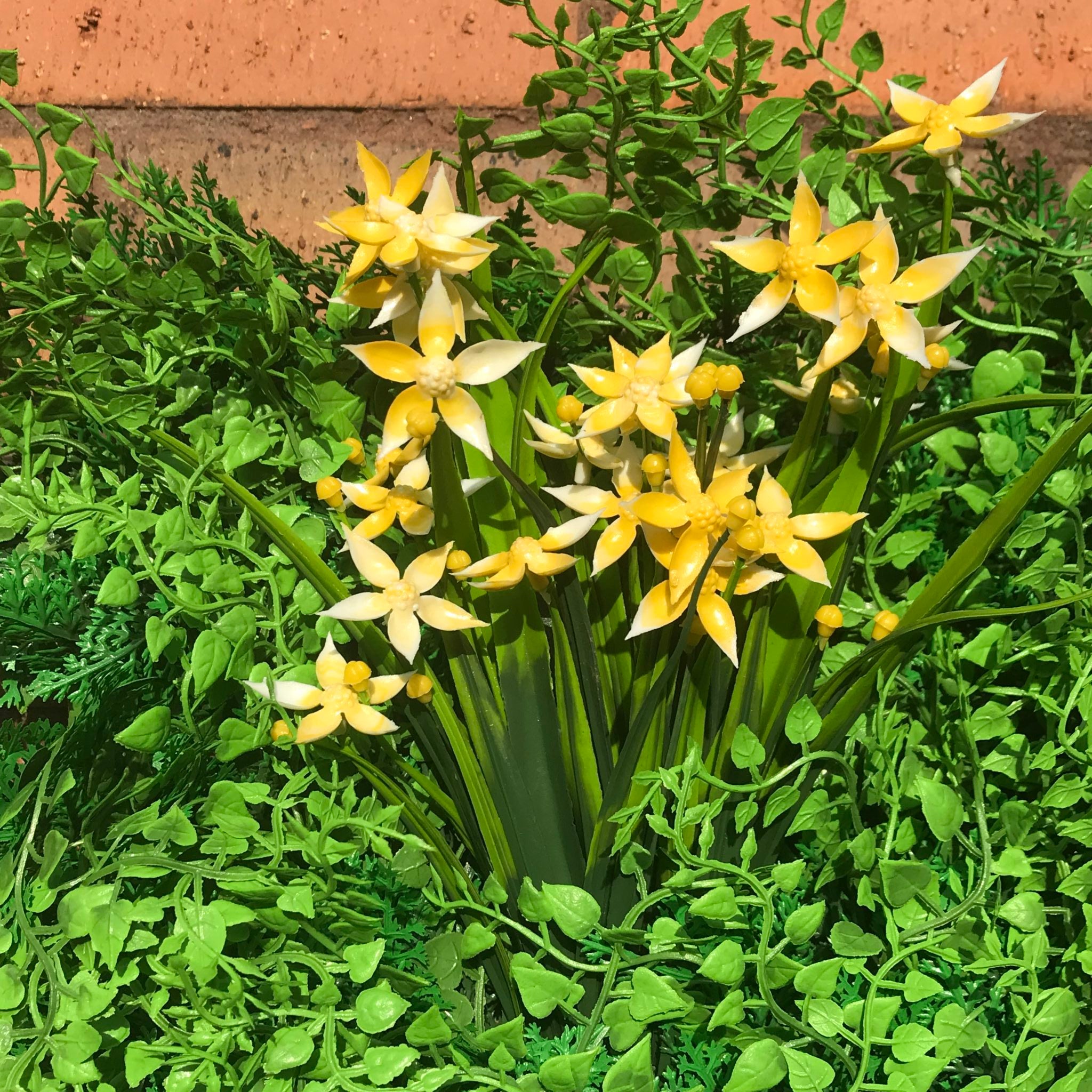 Flame Resistant Artificial Green Wall Hedge Panel measuring 100 x 100 cm, featuring a mix of lush leaves, grass, and fern for a dense, luxurious appearance.