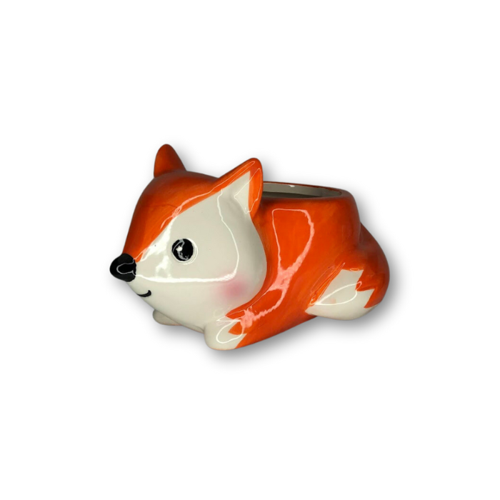 A charming fox-shaped flower pot, perfect for small plants, featuring a drainage hole at the bottom.