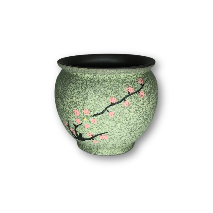 A vibrant green Asian style pot featuring a delicate Cherry Blossom branch, perfect for indoor or outdoor decor.