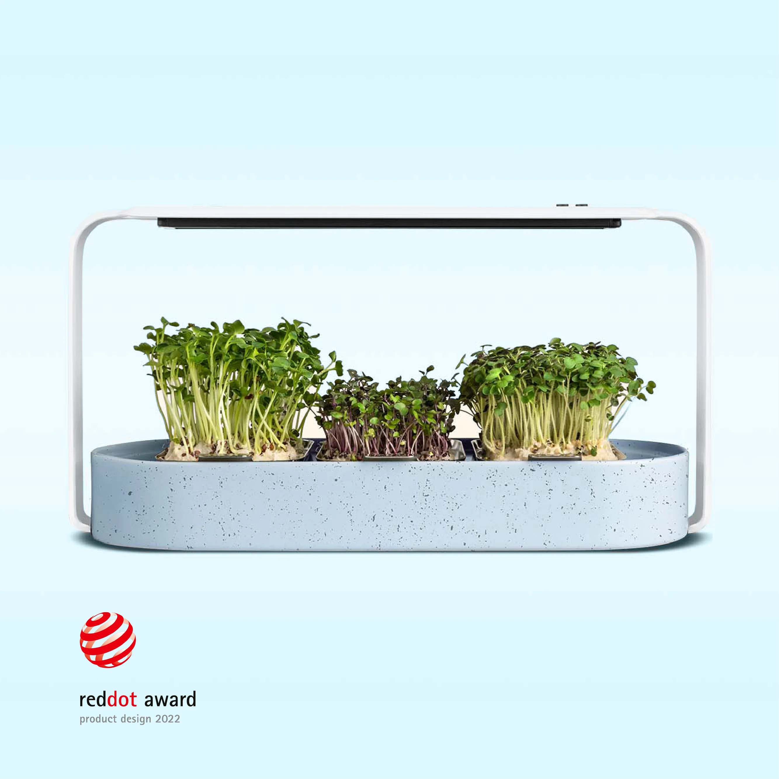 The ingarden bundle offer showcasing a stylish indoor microgreens growing system with vibrant green plants ready for harvest.