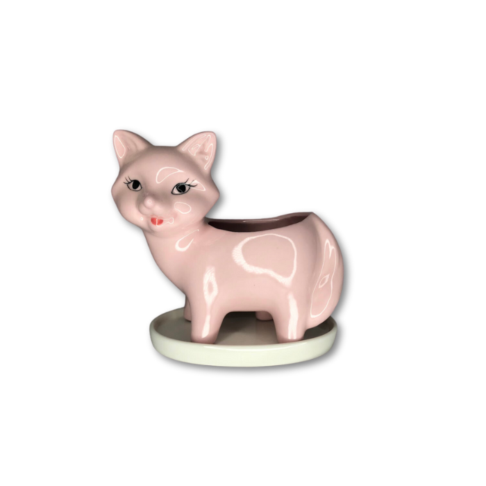 A charming pink fox flower pot planter with a base, featuring a drainage hole and a whimsical design, perfect for indoor plants.