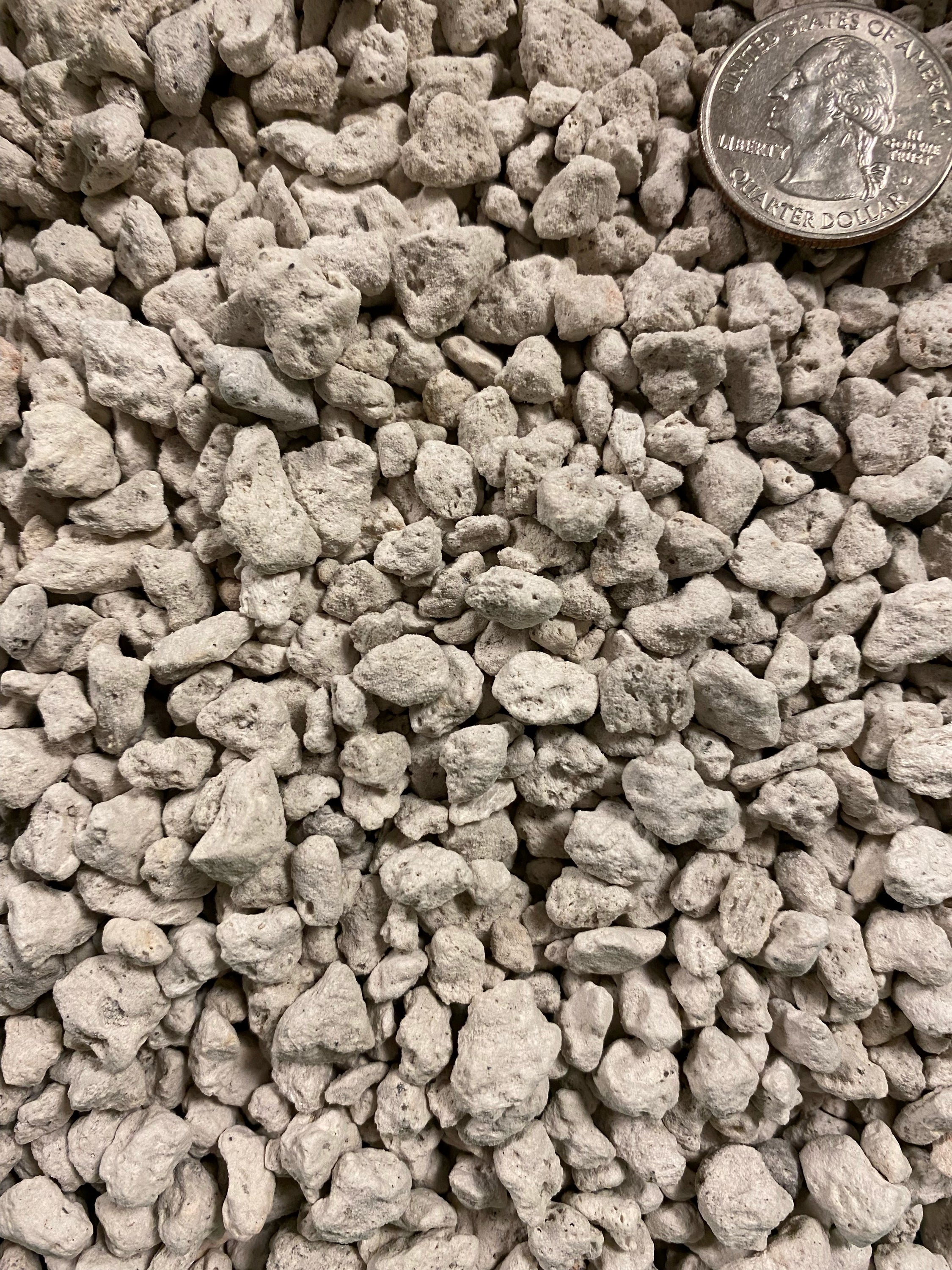 A bag of Sol Soils pumice, a lightweight volcanic rock soil amendment, ideal for enhancing drainage and moisture retention in potted plants.