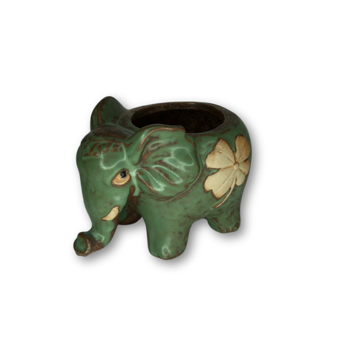 Rustic antique green elephant flower pot with four leaf clover design, perfect for small plants.