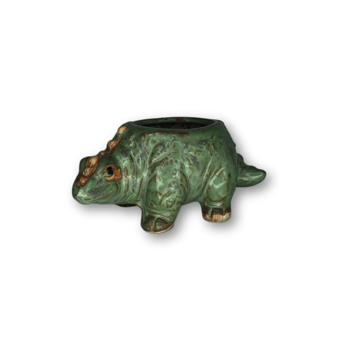 Rustic Antique Green Stegosaurus Dinosaur Flower Pot with a charming design, perfect for small plants.