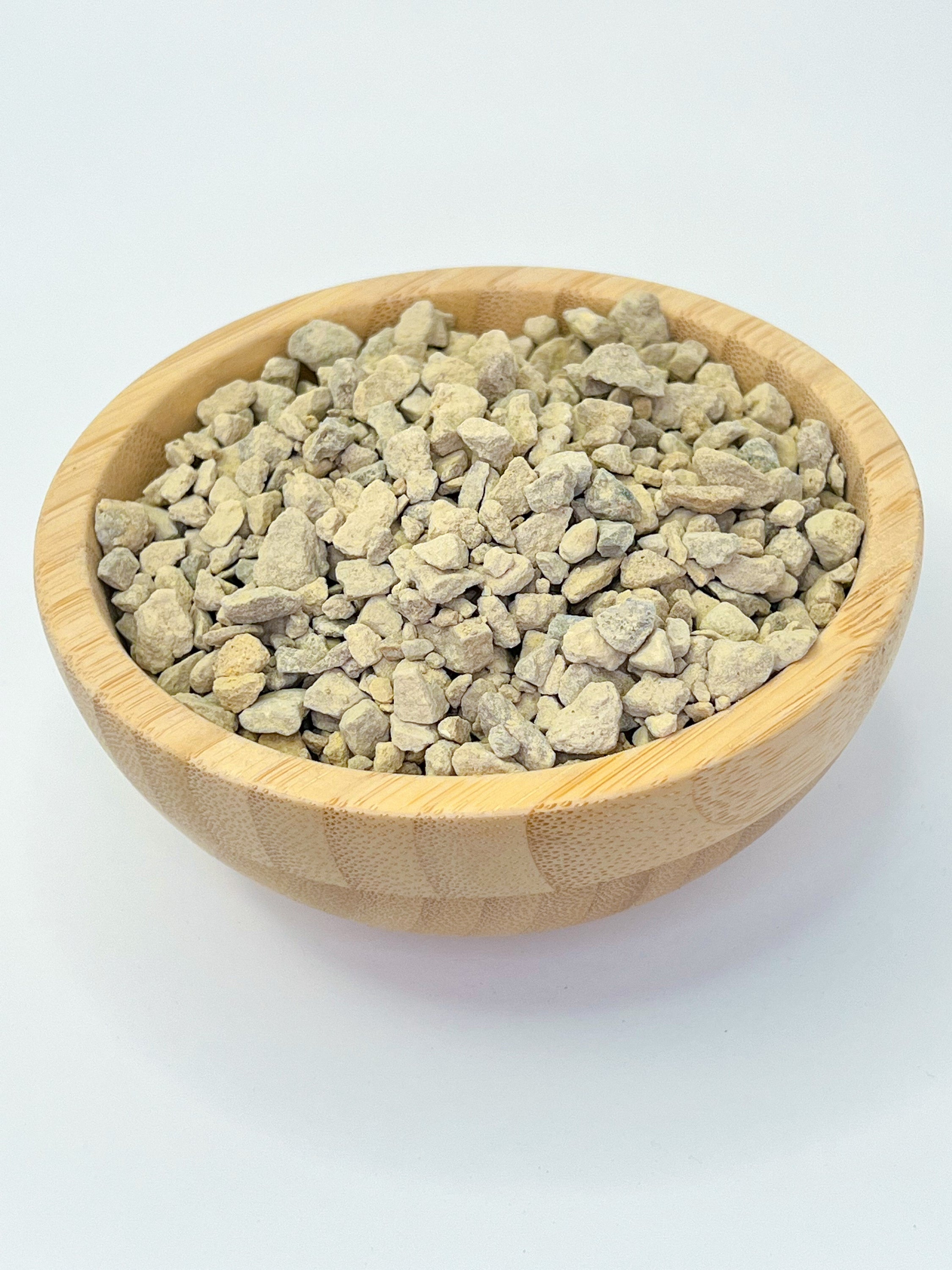 Saharan Gold Topper featuring vibrant yellow dolomite, perfect for enhancing potted plants and providing pest protection.