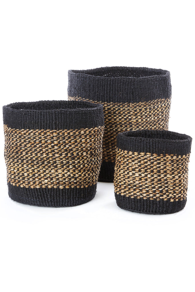 Set of three handwoven sisal and banana fiber baskets in varying sizes, showcasing natural colors and intricate patterns, perfect for storage and planters.