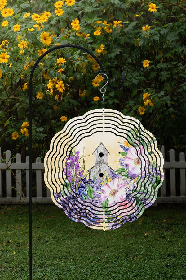 A vibrant 10-inch aluminum wind spinner featuring a floral design on a yellow background, perfect for spring home decor.