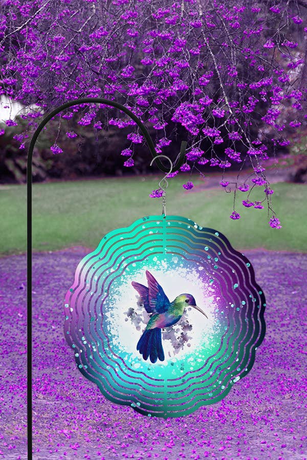 A colorful 10-inch aluminum wind spinner featuring a hummingbird design in purple, green, and blue, perfect for spring home decor.