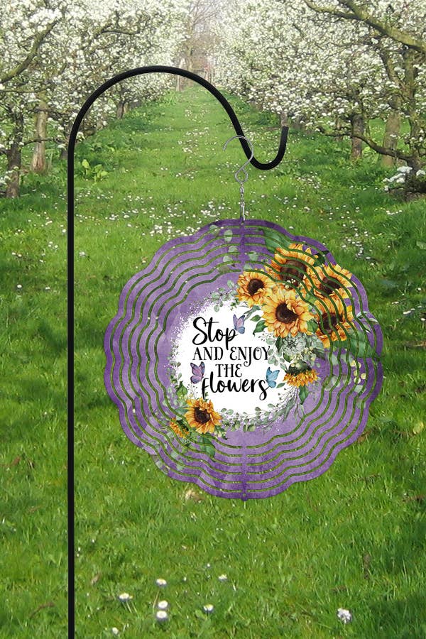 Colorful 10-inch double-sided wind spinner featuring floral designs, perfect for spring home decor and outdoor spaces.