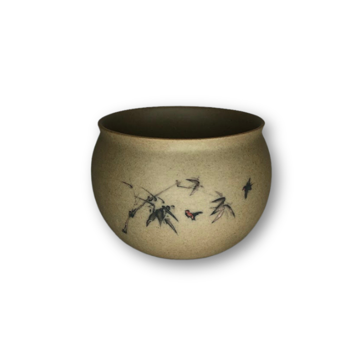 Tan Asian style pot featuring a tree limb and birds, perfect for small plants, with a drain hole at the bottom.