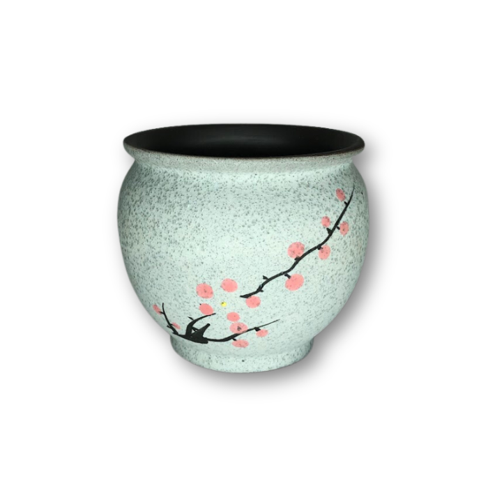 White Asian style pot featuring a cherry blossom branch design, perfect for small plants and decorative use.