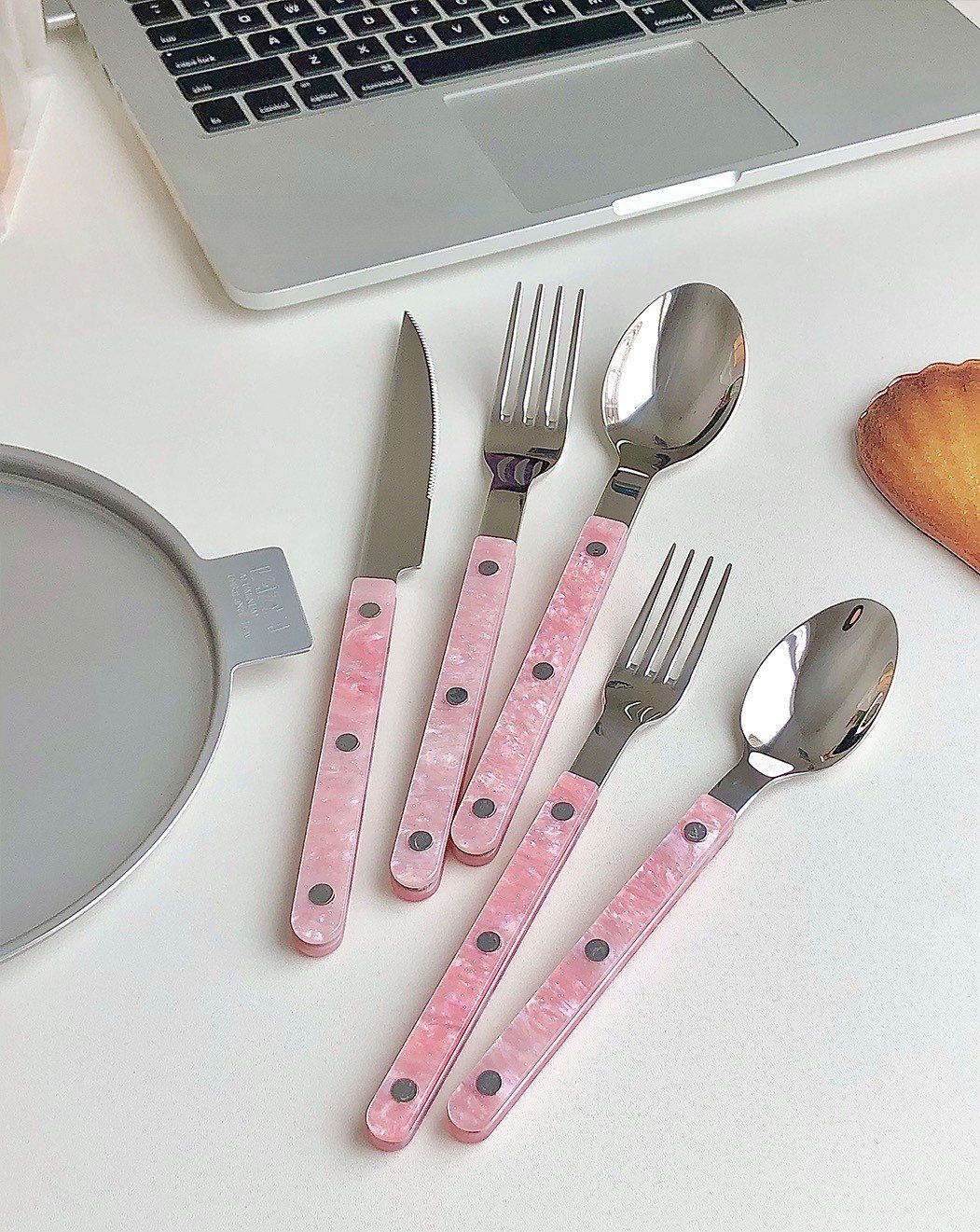 10-Pcs Sleek Modern Pinky Flatware Set featuring stainless steel utensils in a minimalist design, perfect for elegant dining.