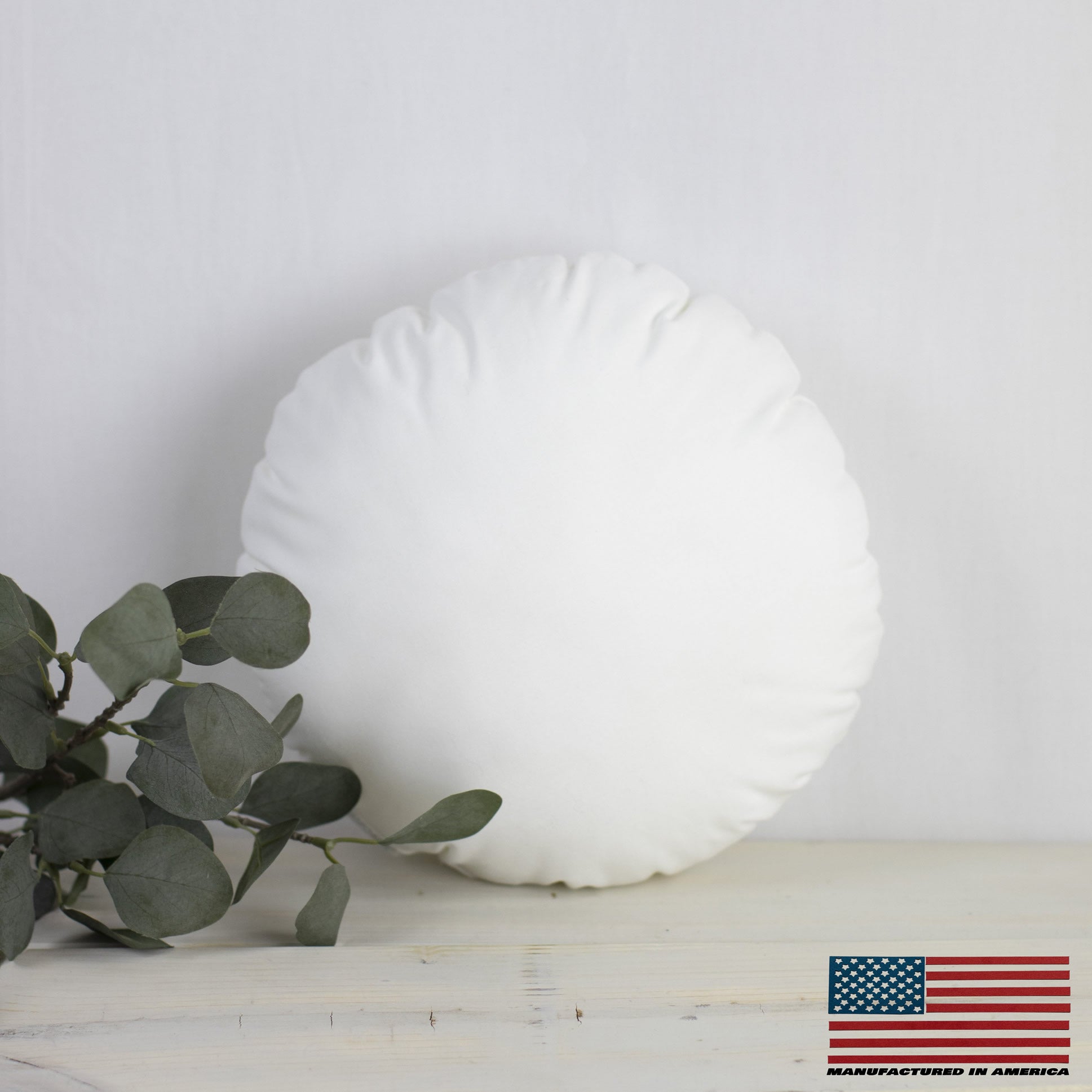 12-inch round angel hair down alternative pillow insert with soft hypoallergenic polyester fill and durable woven cotton blend fabric.