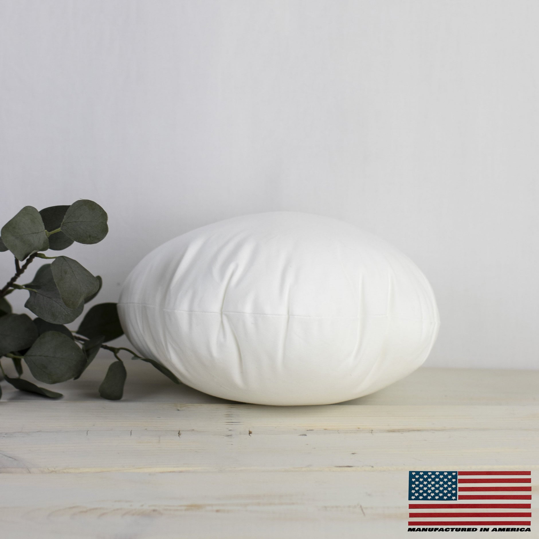 12-inch round angel hair down alternative pillow insert with soft hypoallergenic polyester fill and durable woven cotton blend fabric.