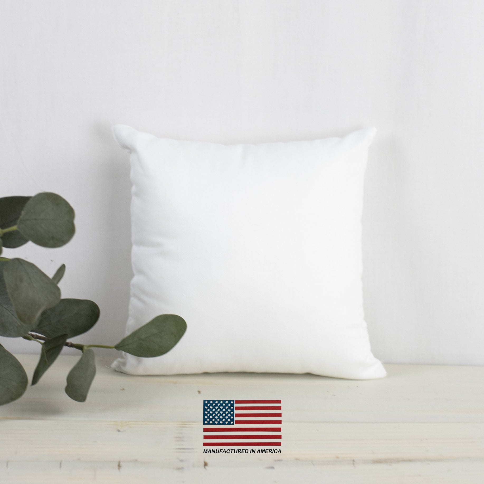 A 13x13 hypoallergenic polyester pillow insert, showcasing its plush texture and durable woven cotton blend fabric, perfect for indoor and outdoor use.