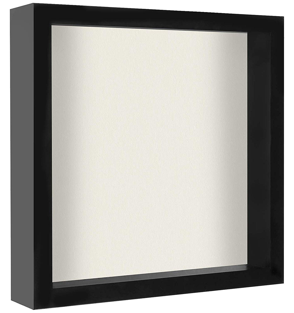 Black 11x11 shadow box frame with shatterproof glass front, displaying memorabilia and photos.