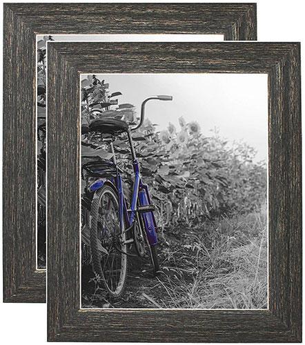 Two rustic barnwood style picture frames, each 8x10 inches, with polished glass fronts and easel stands for display.